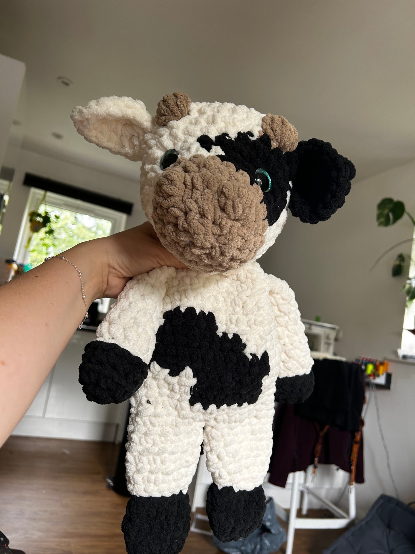 Handmade Crochet Cow Snuggler – Soft and Cuddly Comfort